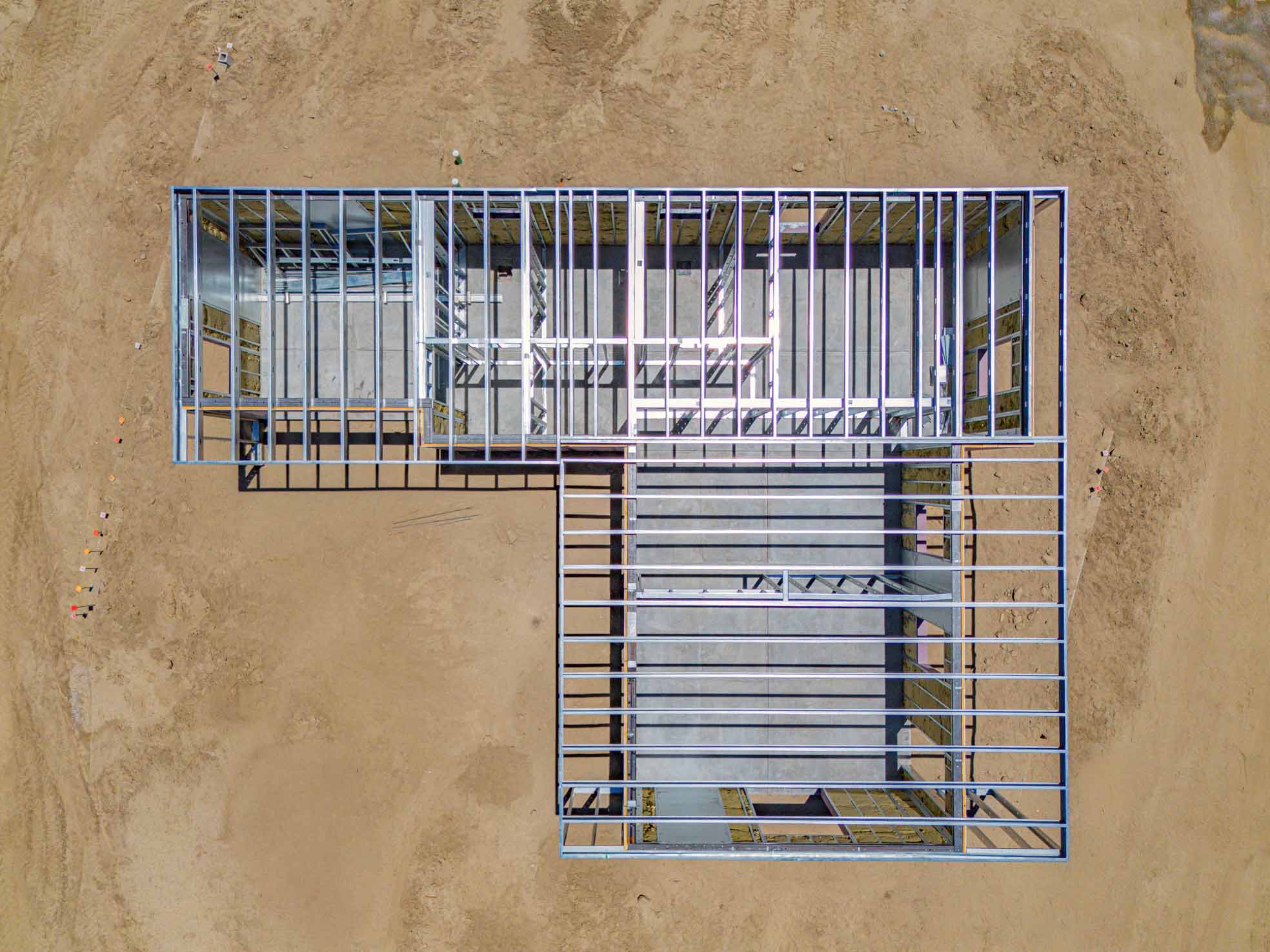 Borrego Springs structure mid-assembly, roof framing installed